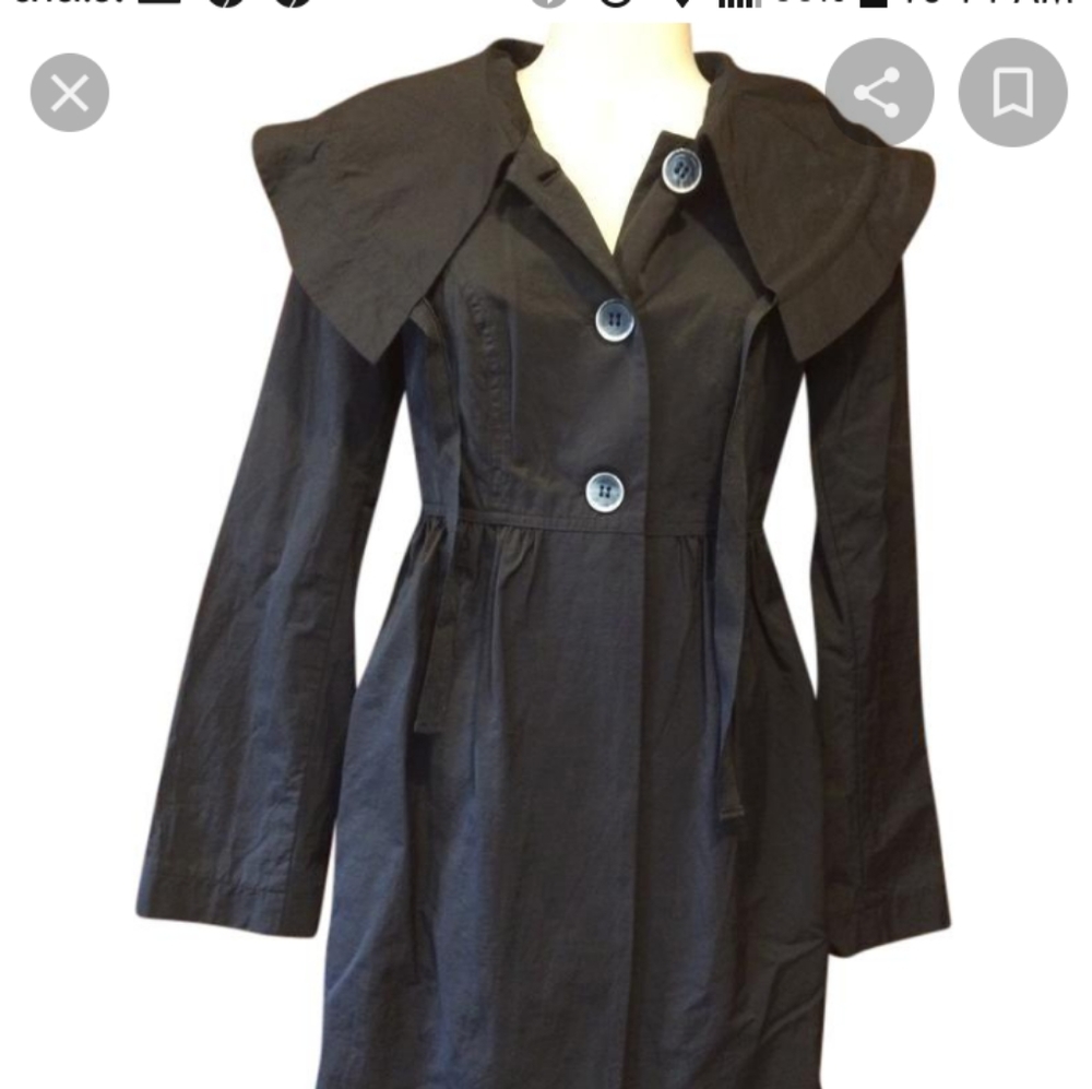 Ladies Daisy Fuentes rain coat